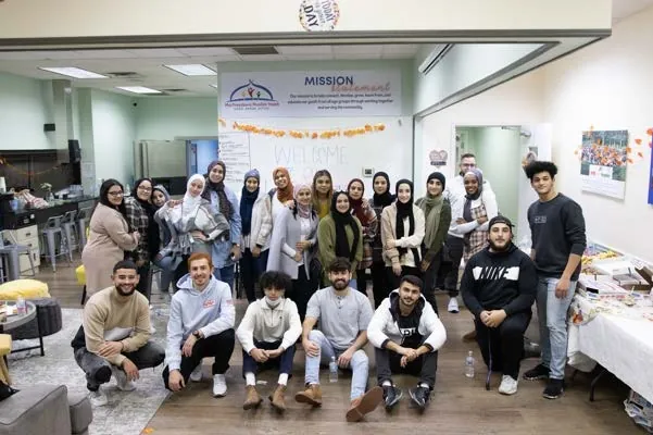 MMY youth and volunteers gathered inside the MMY Center in 2021